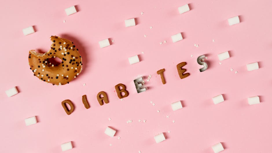Creative depiction of diabetes with a donut, sugar cubes, and letters on a pink background.