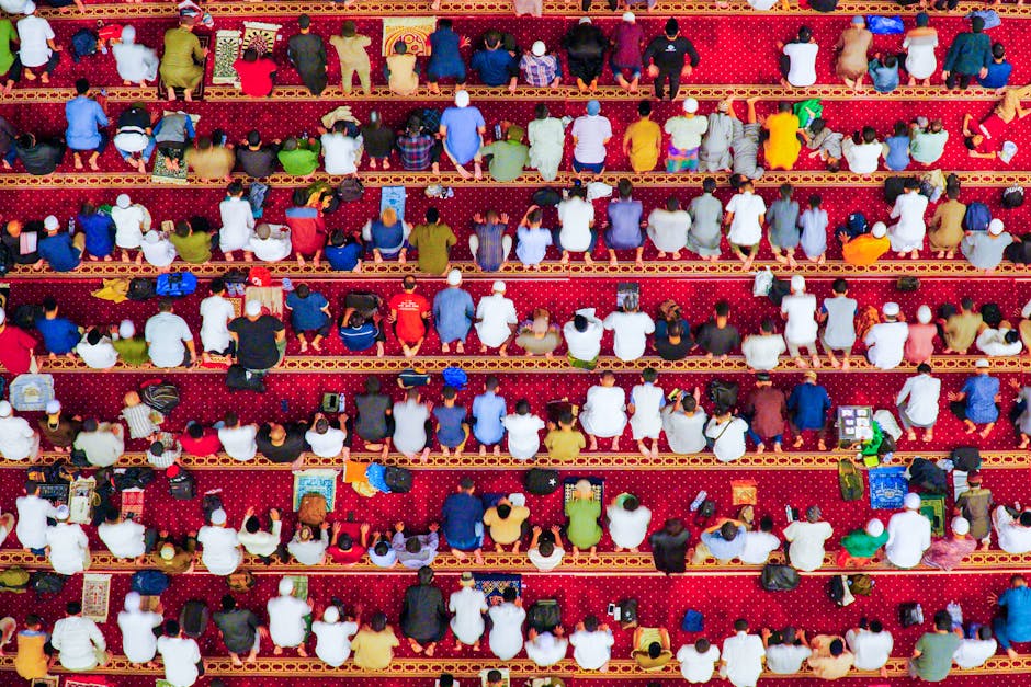 middle-aged-men-talking-over-drinks